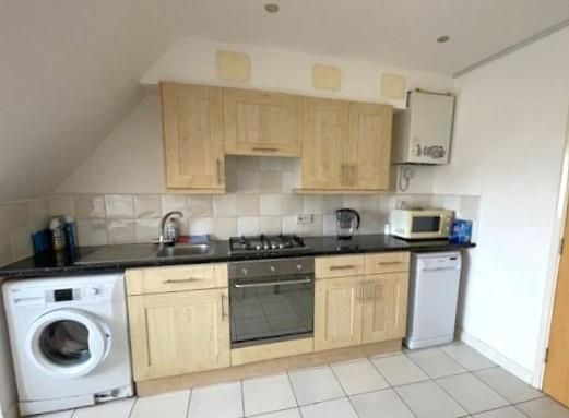 Property photo 3 of 6 Kitchen