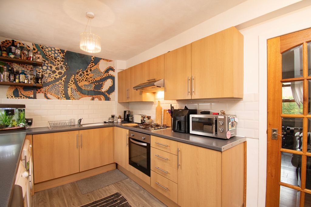 Property photo 3 of 22 Dining Kitchen
