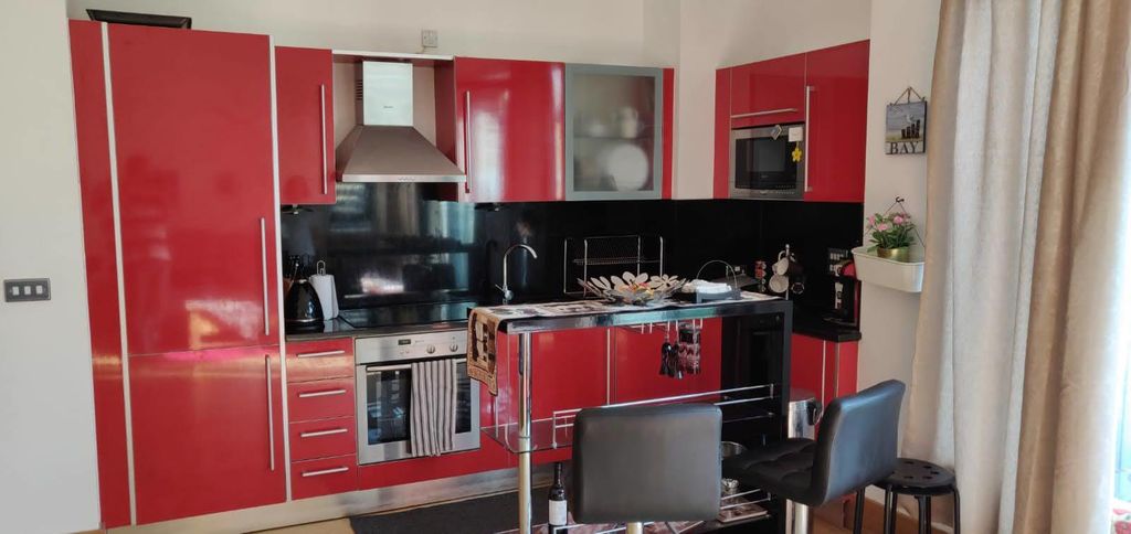 Property photo 1 of 18 Kitchen Area