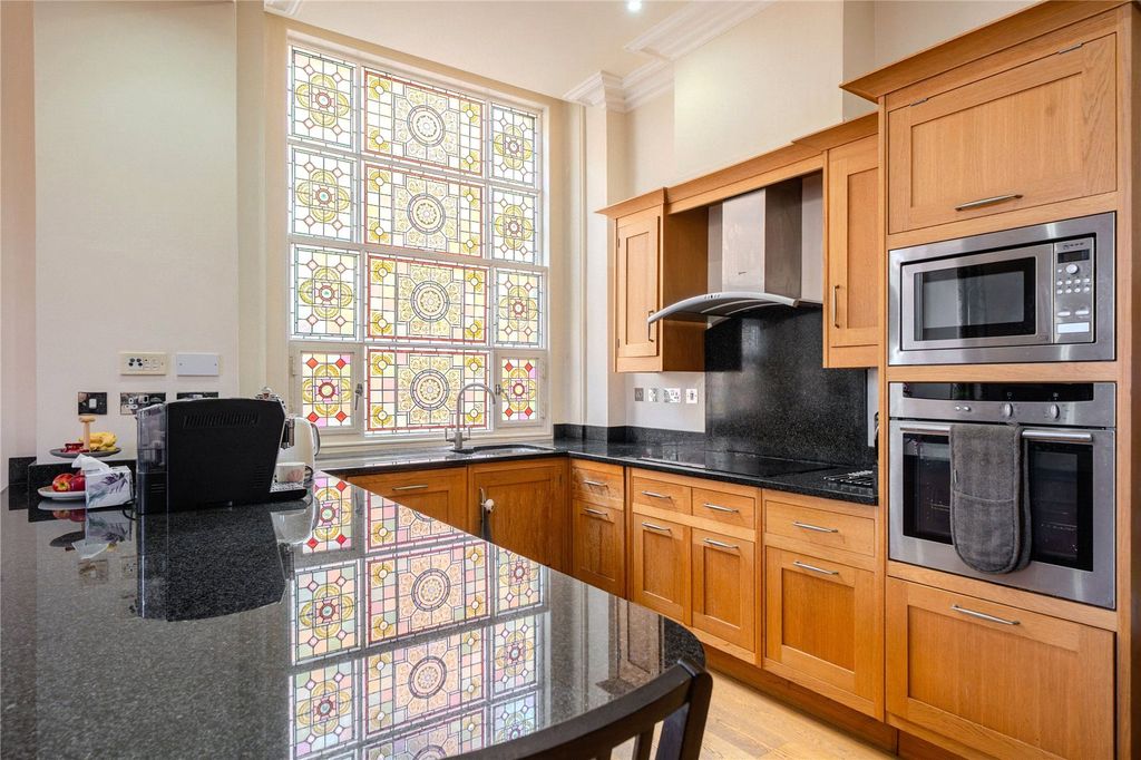 Property photo 3 of 12 Kitchen
