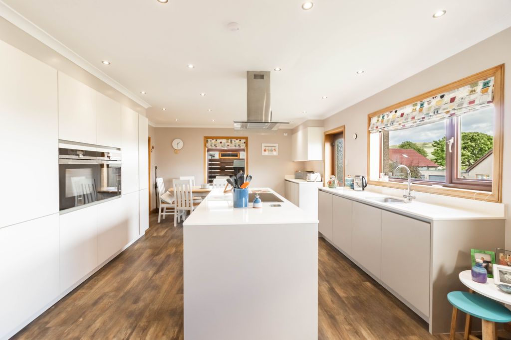 Property photo 2 of 34 Dining Kitchen