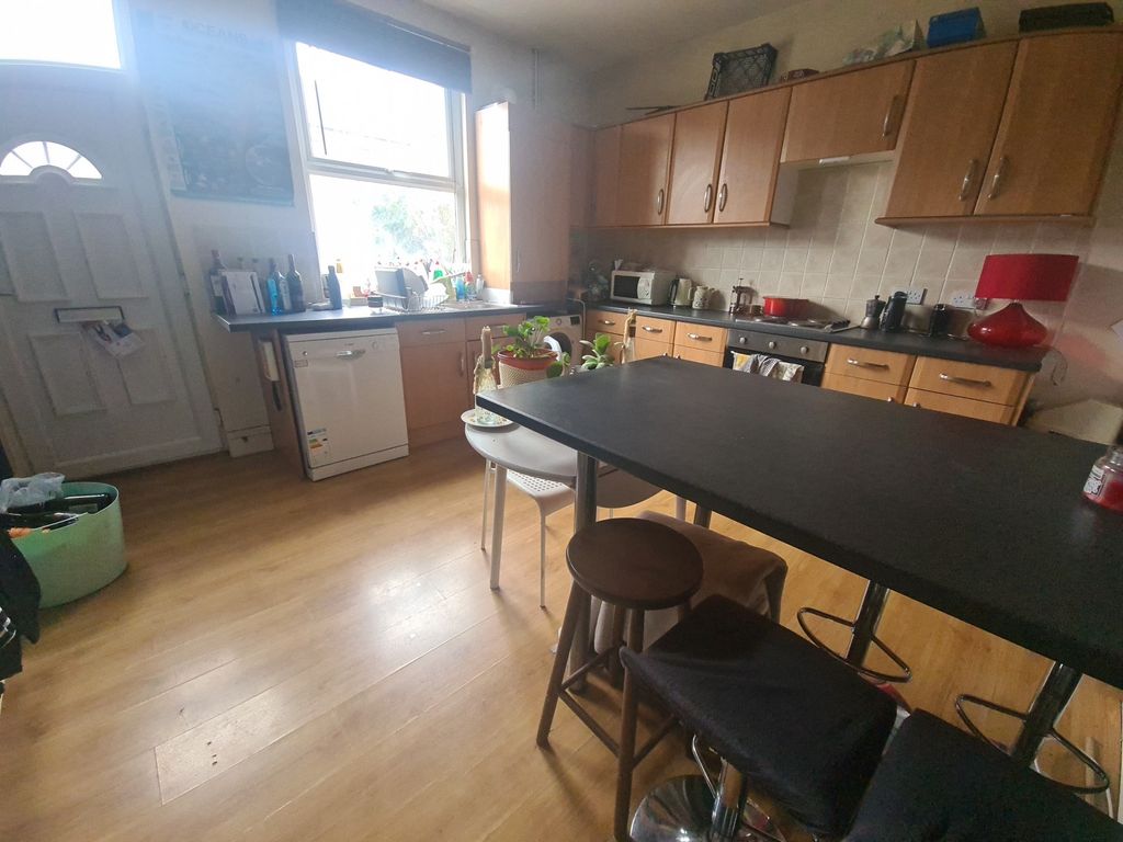 Property photo 2 of 12 A Bright And Spacious Living Room Featuring A Larg...