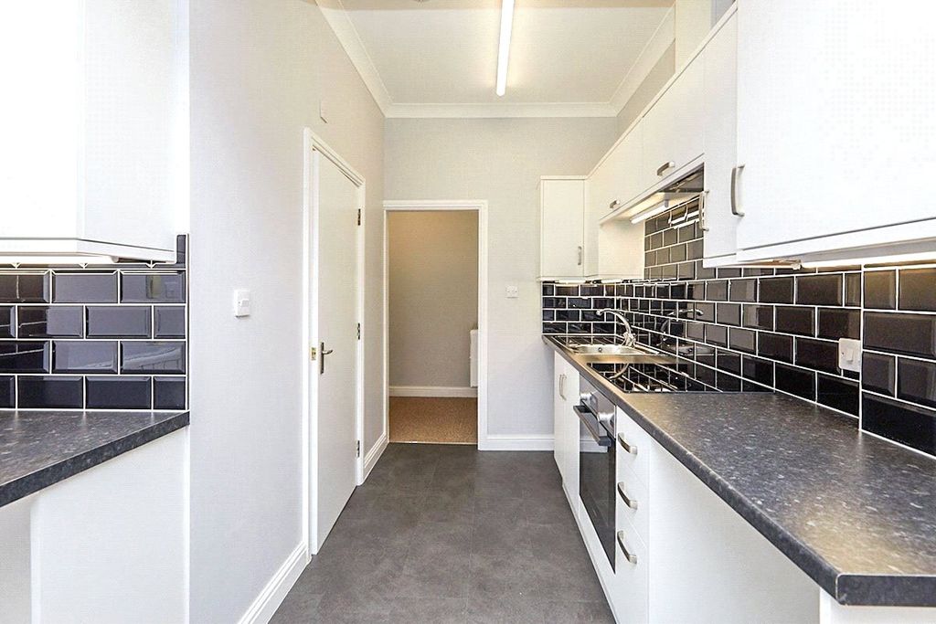 Property photo 3 of 8 Kitchen Area