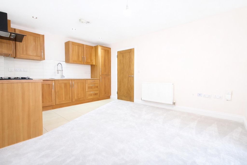 Property photo 3 of 9 Spacious Modern Kitchen And Living Area.Png