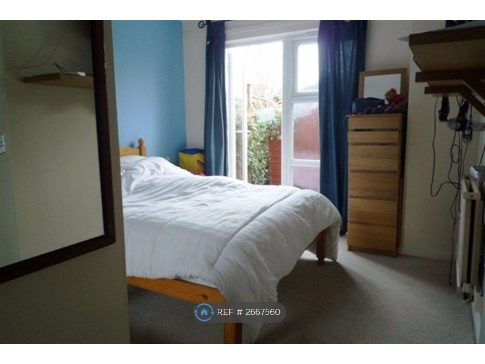 Property photo 3 of 9 Large Bedroom With Access To The Rear Garden