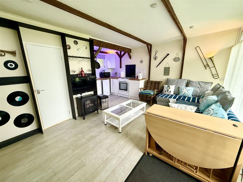 Property photo 2 of 11 Living Area