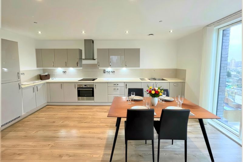 Property photo 3 of 9 Kitchen-Dining Area