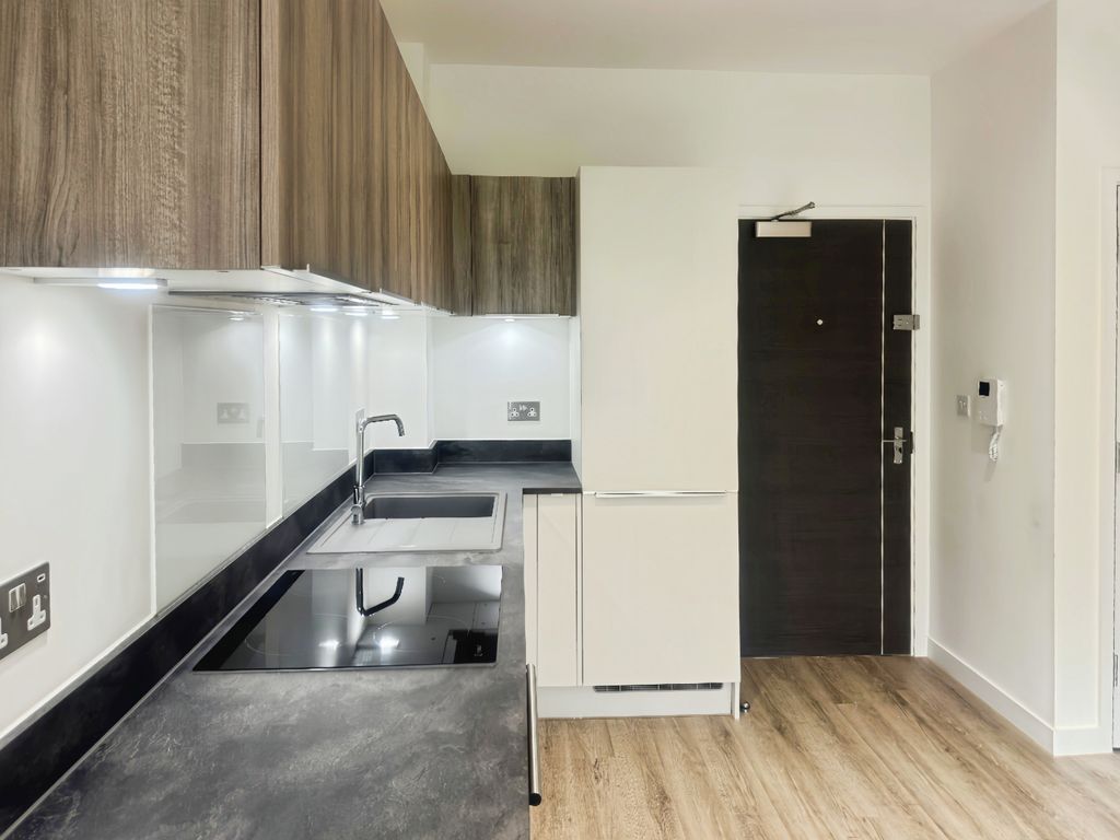 Property photo 3 of 8 Kitchen Area
