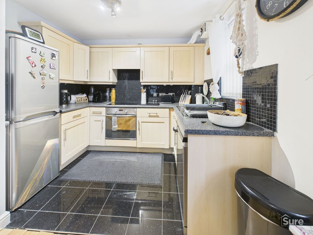 Property photo 3 of 10 Kitchen Area