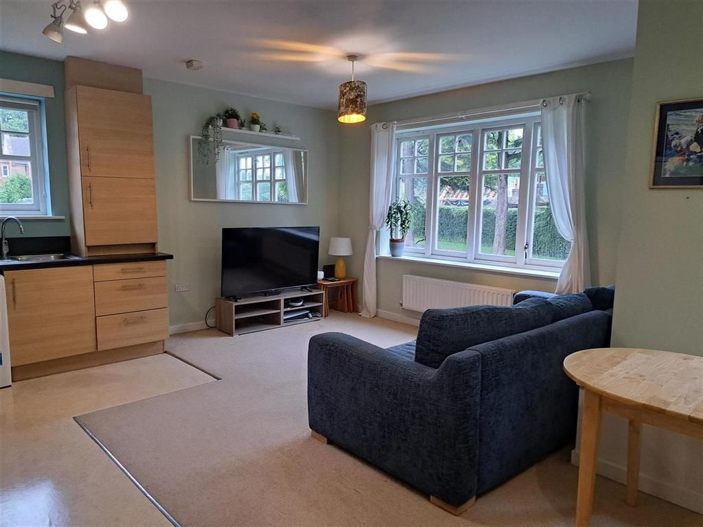 Property photo 1 of 12 Living Area