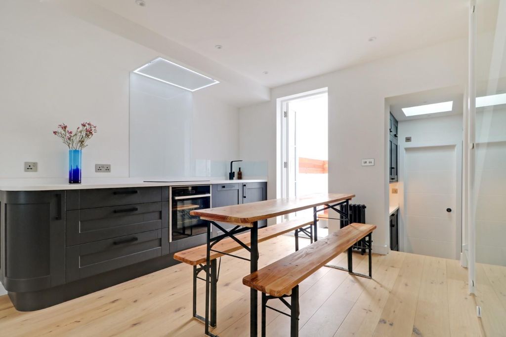 Property photo 3 of 26 Kitchen-Dining Area