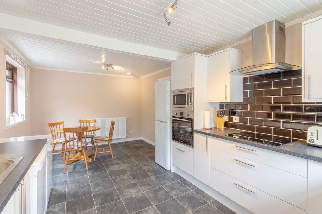 Property photo 3 of 23 Dining Kitchen
