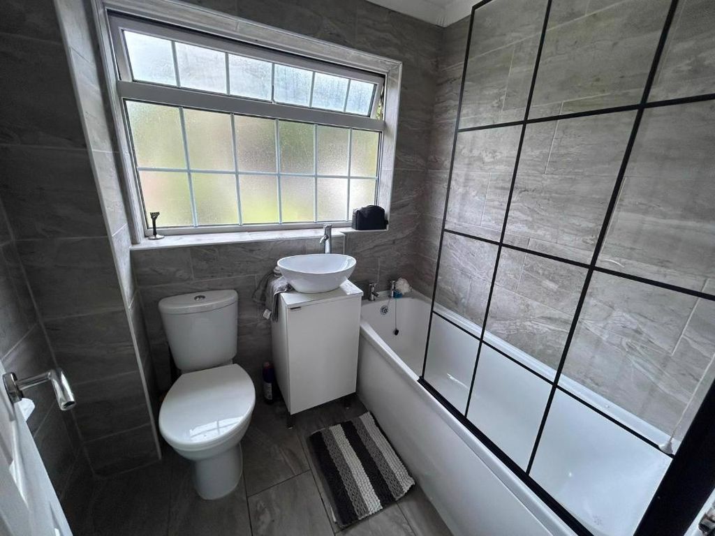Property photo 2 of 12 Modern Bathroom With Bath And Shower