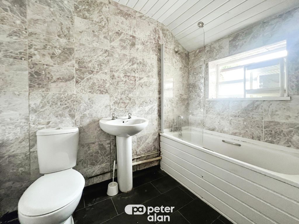 Property photo 3 of 8 Front