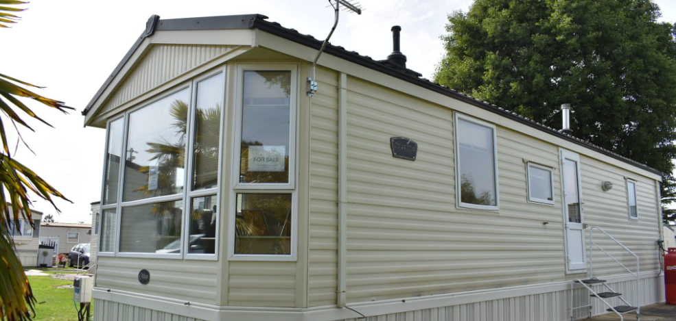 Property photo 1 of 9 Exterior View Of The Holiday Caravan At Eastland Meadows Country Park, Showing The Cream Cladding, Large Front Windows And Side Entrance Steps
