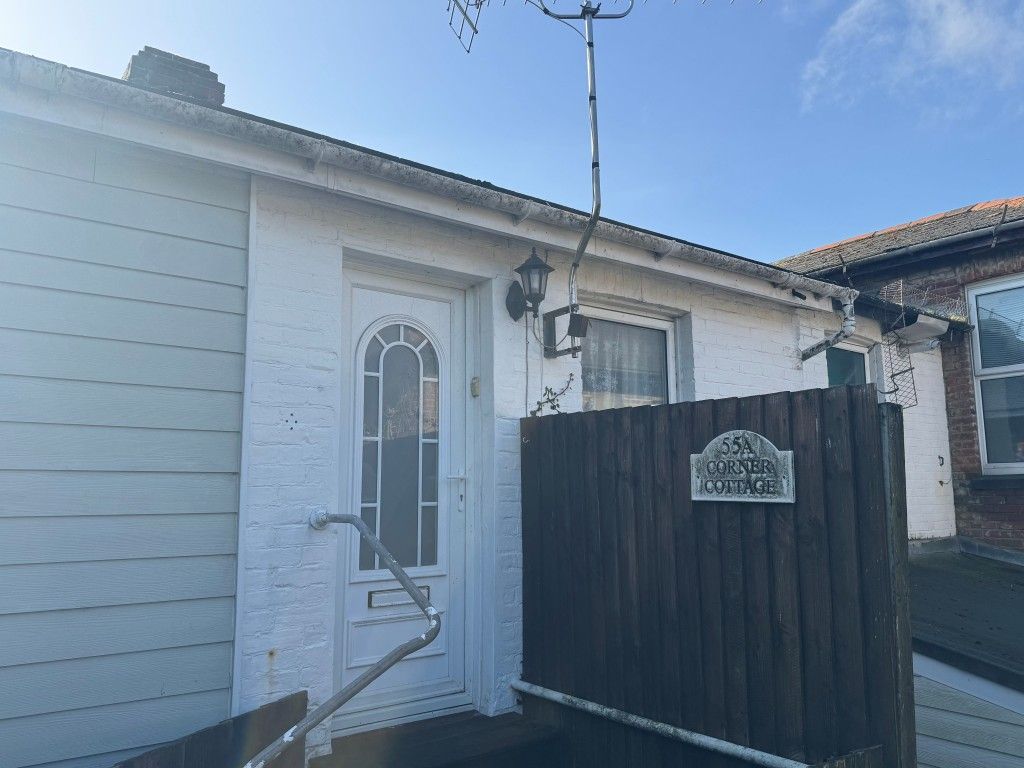 Property photo 2 of 8 Front Door On The Side Elevation