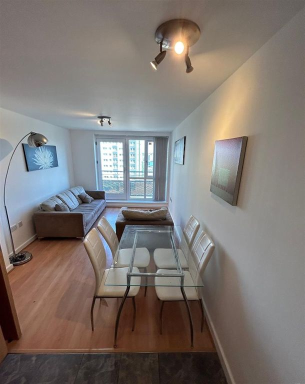 Property photo 1 of 7 Bright Lounge With Dining Area And Balcony View...