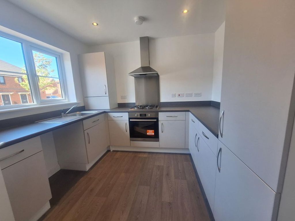 Property photo 2 of 18 Typical Kitchen