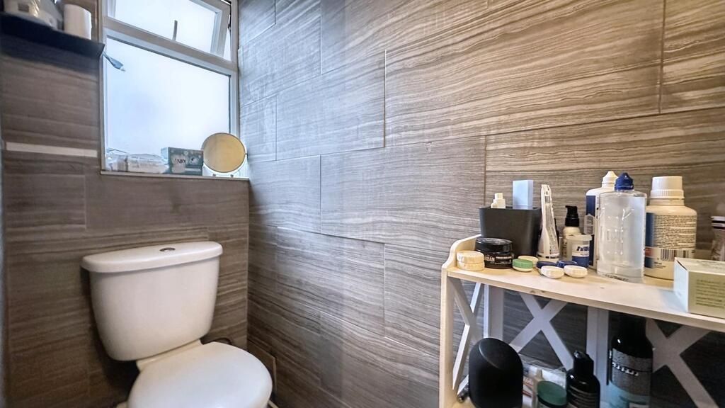 Property photo 1 of 5 Modern Bathroom With Stylish Textured Tiles...