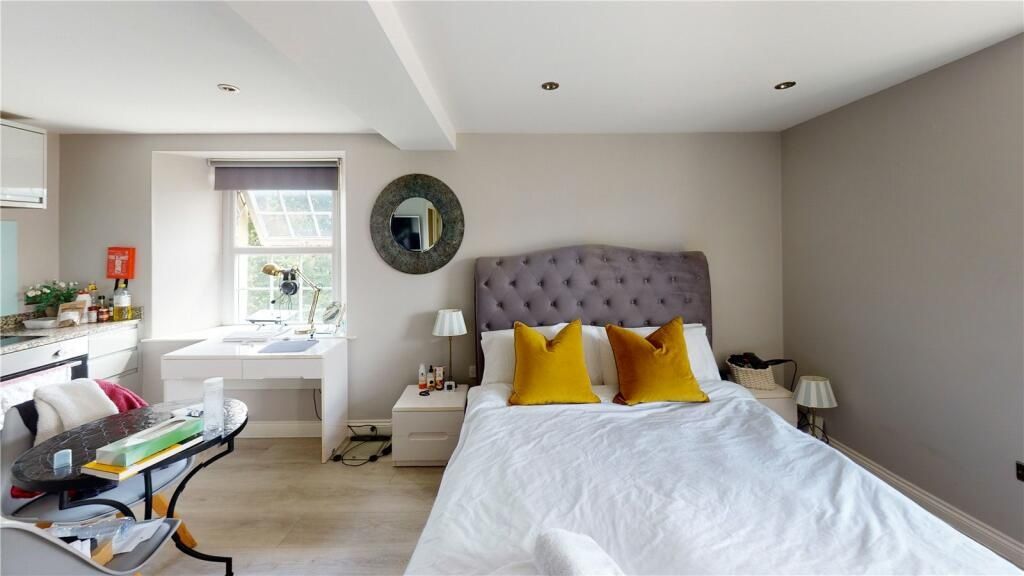 Property photo 1 of 6 Bright And Inviting Master Bedroom Featuring A Com...