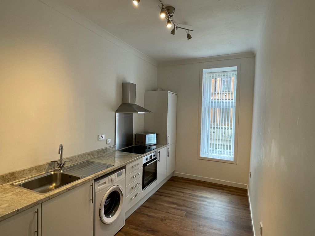 Property photo 3 of 13 Kitchen