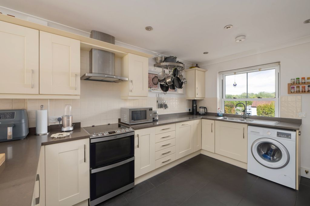Property photo 3 of 24 Kitchen Area