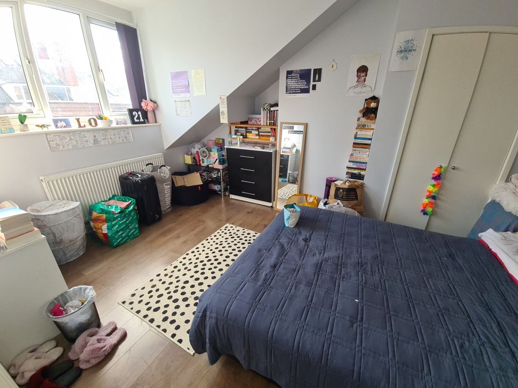 Property photo 2 of 7 Bright And Cozy Master Bedroom Featuring A Large d...