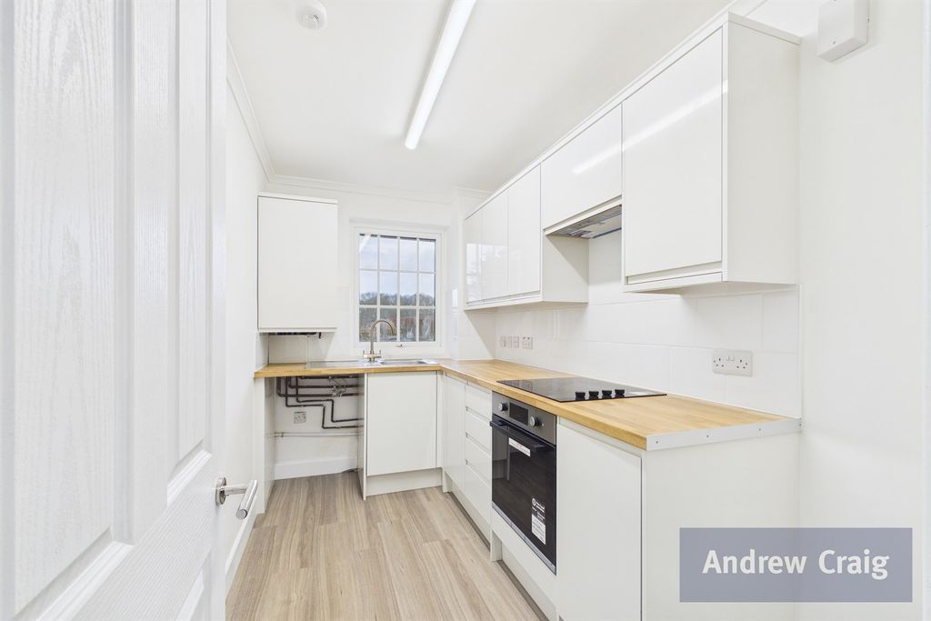 Property photo 3 of 12 Kitchen