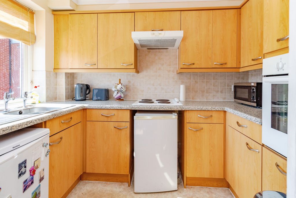 Property photo 3 of 13 Kitchen