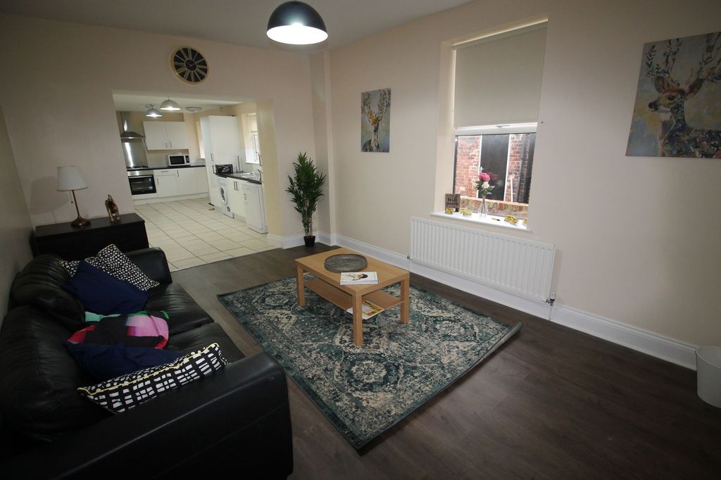 Property photo 2 of 6 Bright, Open-Plan Living Area With A Comfortable B...