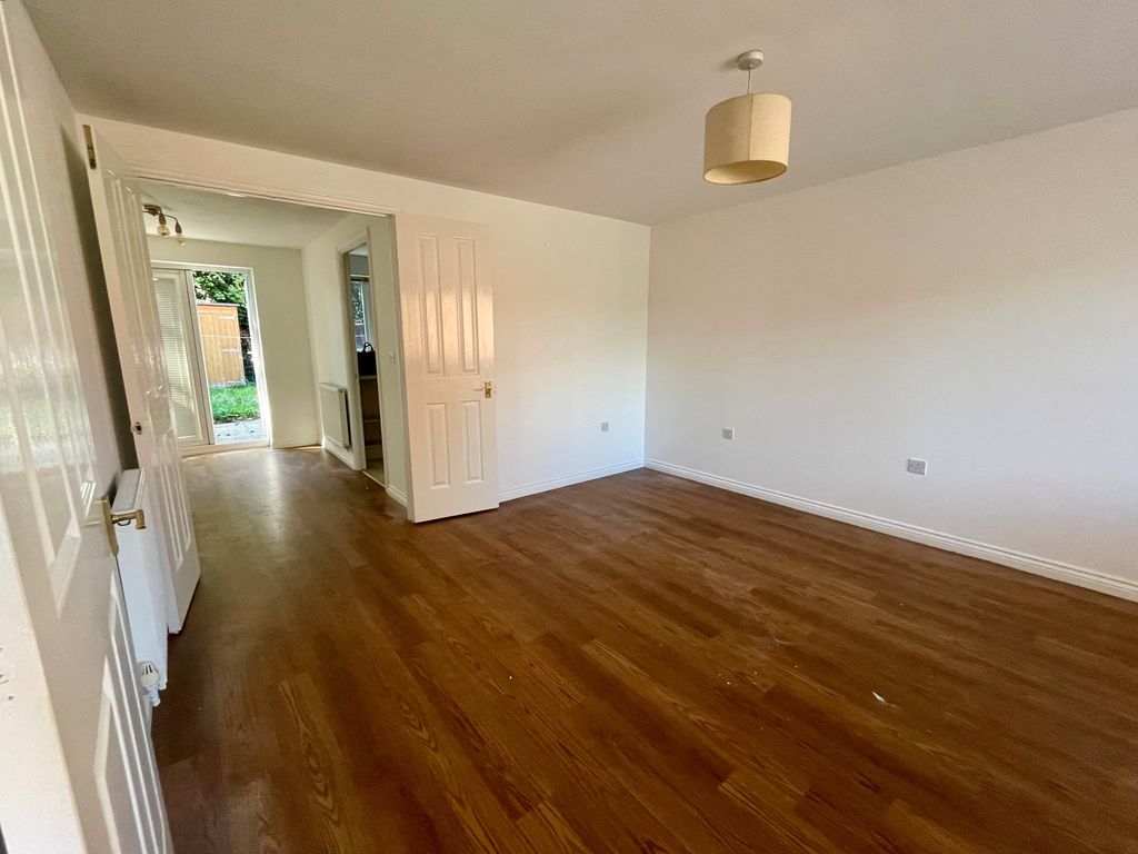 Property photo 2 of 12 Living Area