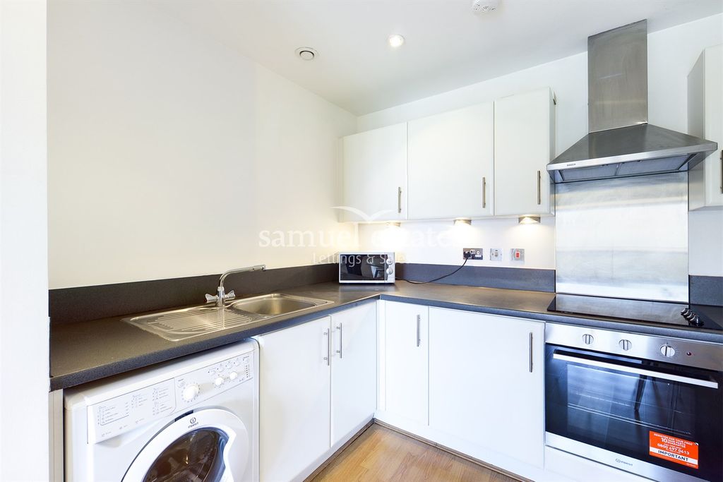 Property photo 3 of 12 Kitchen