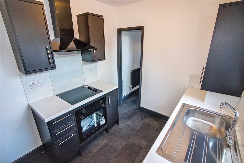Property photo 3 of 8 Kitchen