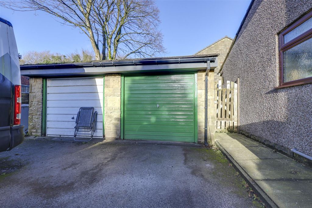 Property photo 3 of 15 Garage &amp; Driveway