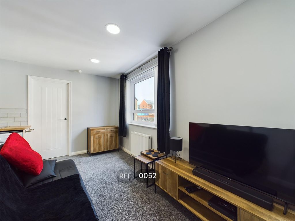 Property photo 2 of 10 Kitchen &amp; Living Area