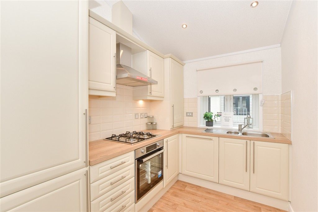 Property photo 3 of 12 Kitchen Area