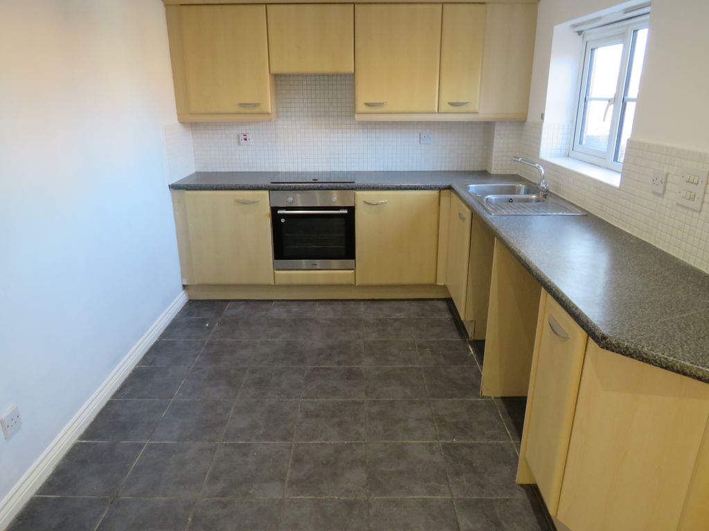 Property photo 3 of 7 Kitchen
