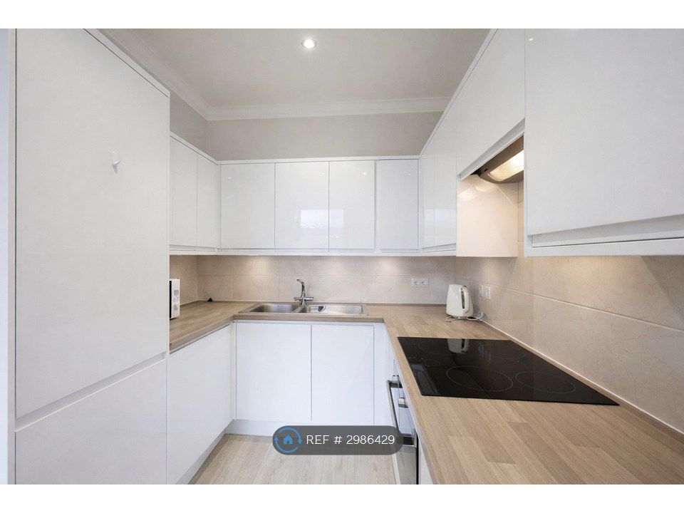 Property photo 3 of 12 Kitchen