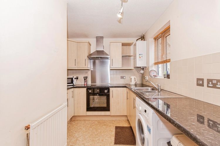 Property photo 3 of 7 Kitchen