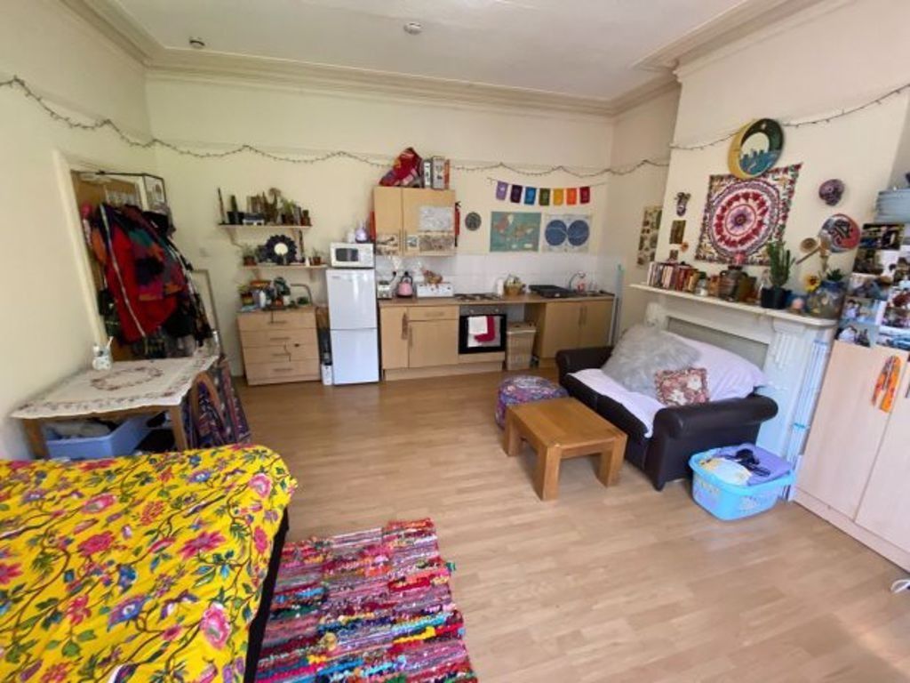 Property photo 3 of 5 A Cozy Living Room With A Colorful And Eclectic St...