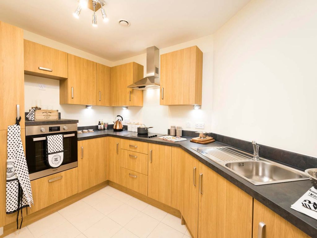 Property photo 3 of 18 Typical Kitchen