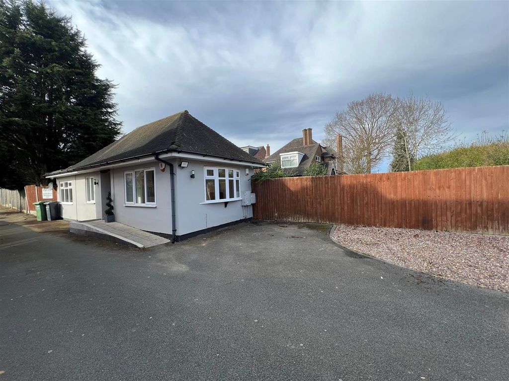 Property photo 2 of 8 Front Parking.Jpg