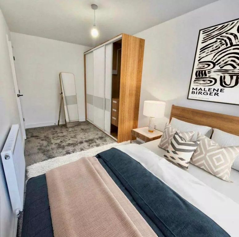 Property photo 2 of 4 This Cozy Double Bedroom Features A Stylish Design...