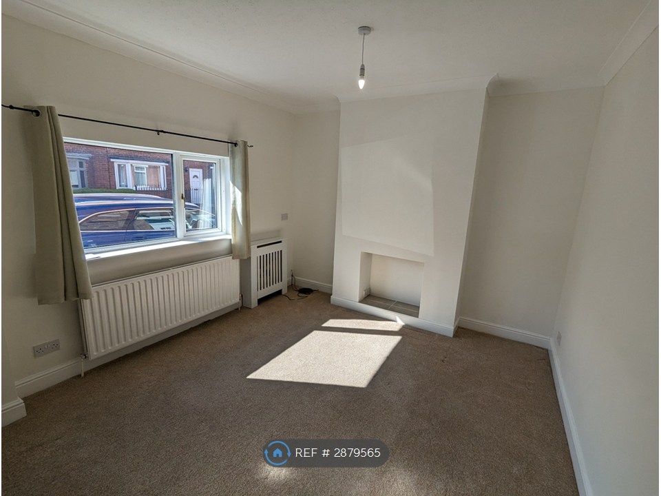 Property photo 2 of 12 Entrance - Living Room