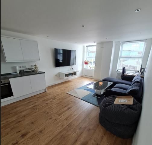 Property photo 1 of 8 Living Area