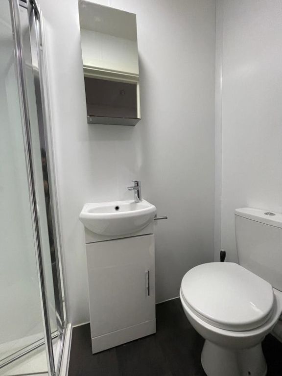 Property photo 2 of 8 Compact, Modern Bathroom With A Shower Cubicle, Wh...