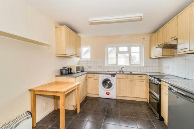 Property photo 3 of 7 Kitchen