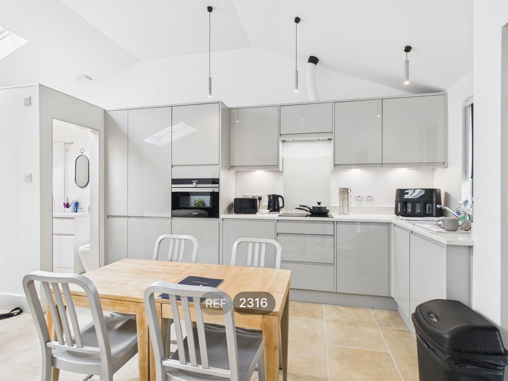 Property photo 3 of 16 Kitchen/Living Area