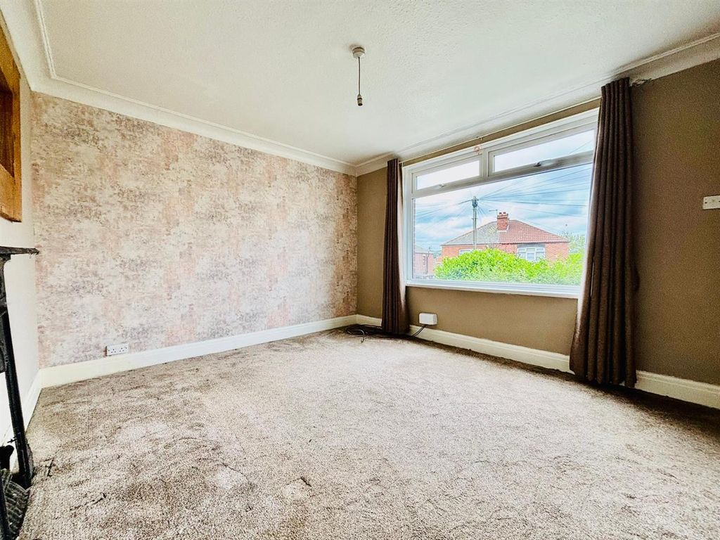 Property photo 2 of 12 Living Room: