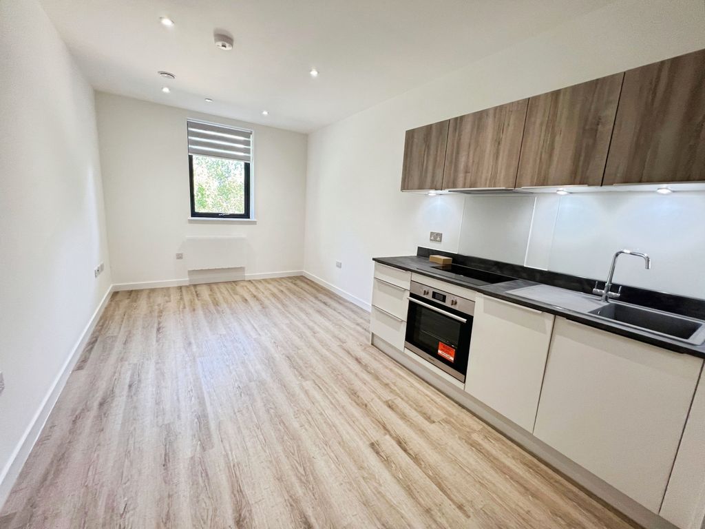 Property photo 2 of 7 Kitchen Area